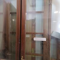 Porta finestra ad arco in legno