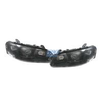 FARI PER OPEL OMEGA 94-99 LENTE A LENTE NERA