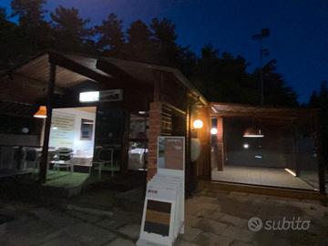 Baita in legno con doppia veranda