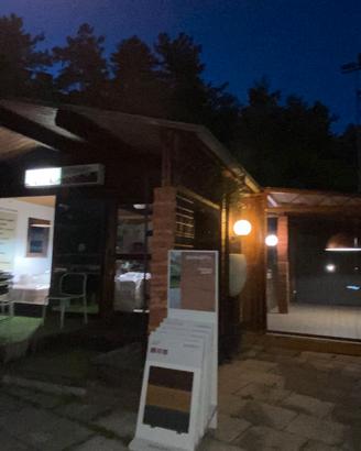 Baita in legno con doppia veranda