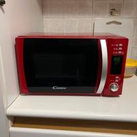 Microonde Candy Rosso Funzionante e Design moderno
