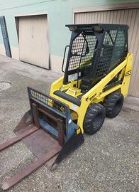 Minipala Bobcat 453 12 Quintali con forche.