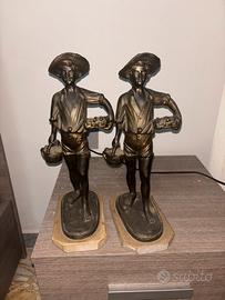 Statuette in bronzo con base in marmo