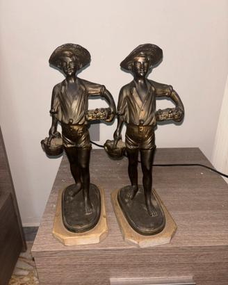 Statuette in bronzo con base in marmo
