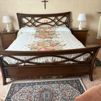 Testiera letto matrimoniale in legno.