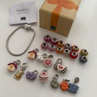 Bracciale Thun completo con 23 charm