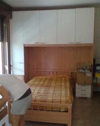 Camera da letto e mobile da soggiorno