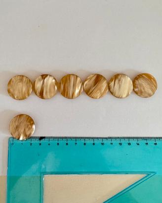 Bottone in simil madreperla rosa