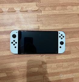 Nintendo Switch OLED + Micro SD 128 Gb