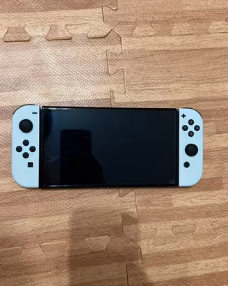Nintendo Switch OLED + Micro SD 128 Gb