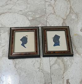 Coppia di silhouette inglesi in cornice legno oro 