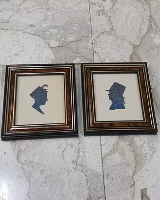 Coppia di silhouette inglesi in cornice legno oro 