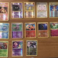 125 carte Pokémon + steel box