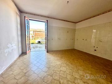 Appartamento al piano terra con tripla esposizione