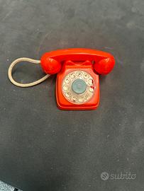 Telefono giocattolo in plastica vintage