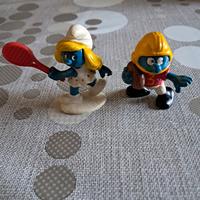 Puffetta tennista e puffo giocatore rugby