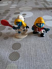 Puffetta tennista e puffo giocatore rugby