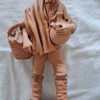 statuina in terracotta