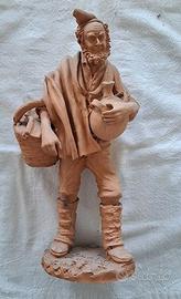 statuina in terracotta