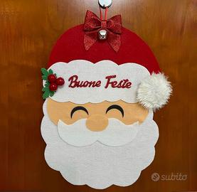 Babbo Natale fuori porta natalizio