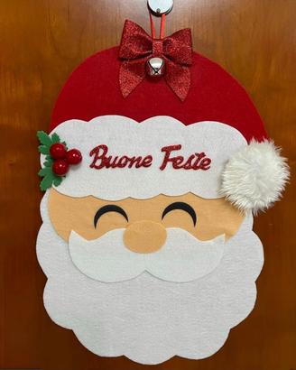 Babbo Natale fuori porta natalizio