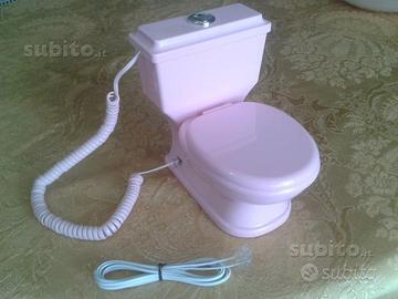 Telefono con filo a forma di wc