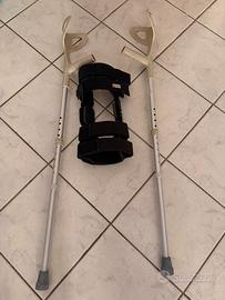 Tutore ( con scatola ) e stampelle