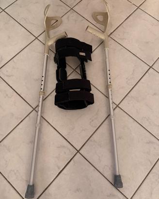 Tutore ( con scatola ) e stampelle