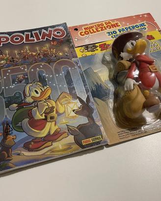 Topolino con statuetta Zio Paperone nel Klondike