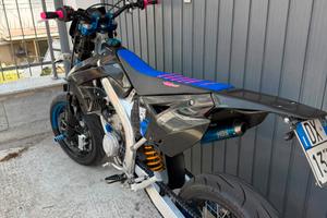 TM 125
