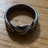 anello a fascia intrecciato in argento