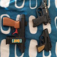 3 pistole giocattolo