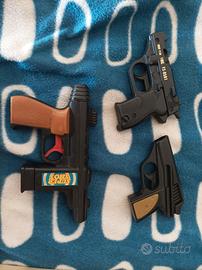 3 pistole giocattolo