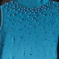 sottogiacca smanicato collo alto 