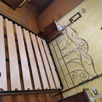Struttura letto matrimoniale in ferro battuto