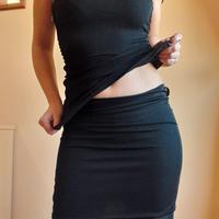 Top e gonna nero glitter con dettaglio catena
Bel