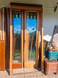 Porta-finestra 2 ante in legno con telaio 115×227
