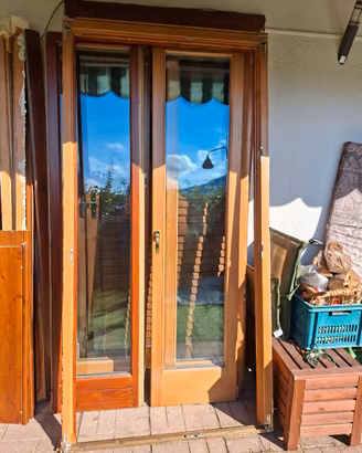 Porta-finestra 2 ante in legno con telaio 115×227