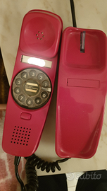 Telefono vintage rosso a rotella