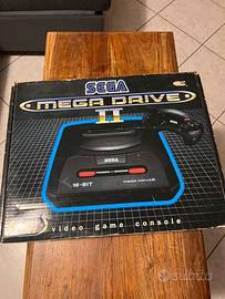 Sega Mega Drive II console con 4 giochi