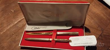 Penna e tagliacarta argento