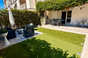 Trilocale di circa 80 mq con giardino e posto auto