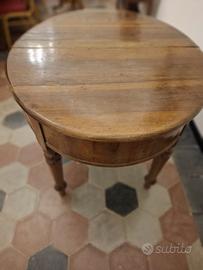 Tavolo ovale allungabile in legno noce massello