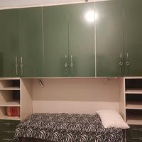 armadio in vero legno con molti scomparti