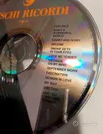 20 dischi CD +2 porta CD. 