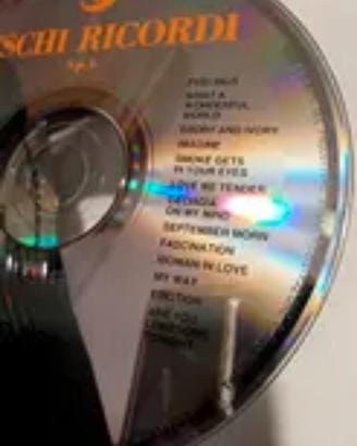 20 dischi CD +2 porta CD. 