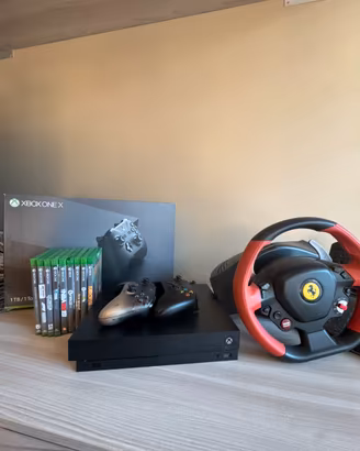 X boxe one x + volante Thrustmaster + giochi