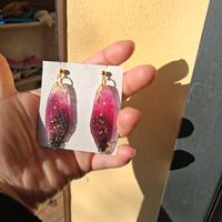 orecchini in resina a forma di ali