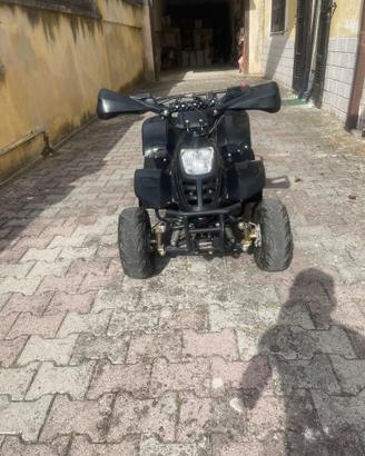 quad 125cc + casco