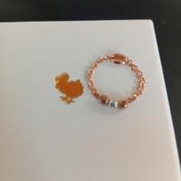 Anello mini granelli oro rosa e argento dodo